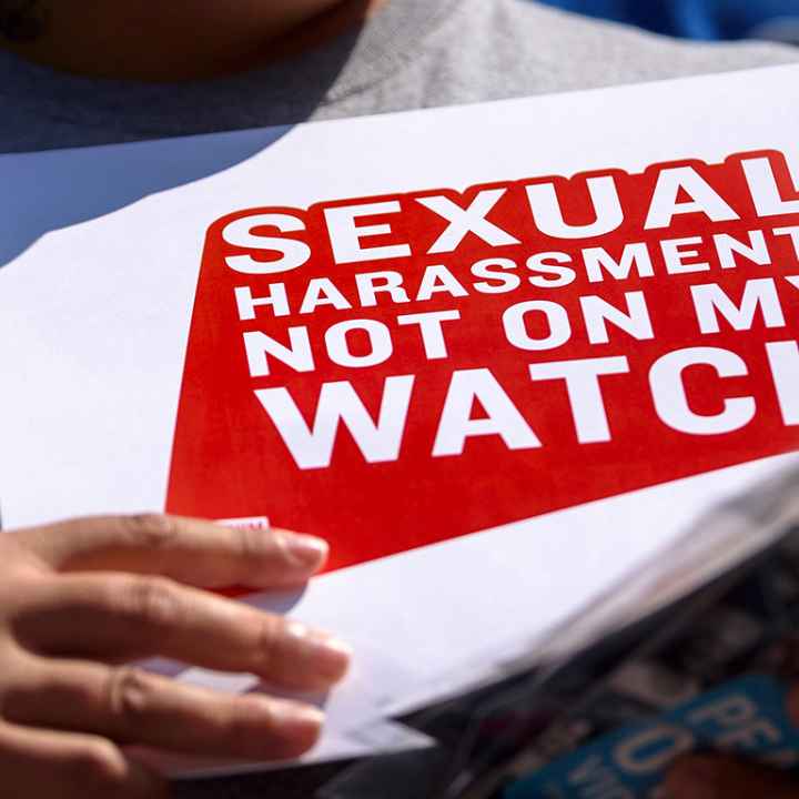 Protester holding sign stating &quot;Sexual Harassment: Not on my Watch